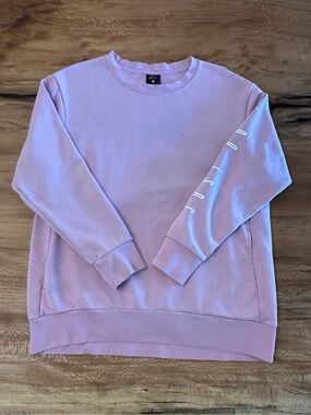 Nike Women's Pink Long Sleeve Just Do It Crewneck Sweatshirt
Pockets Size M